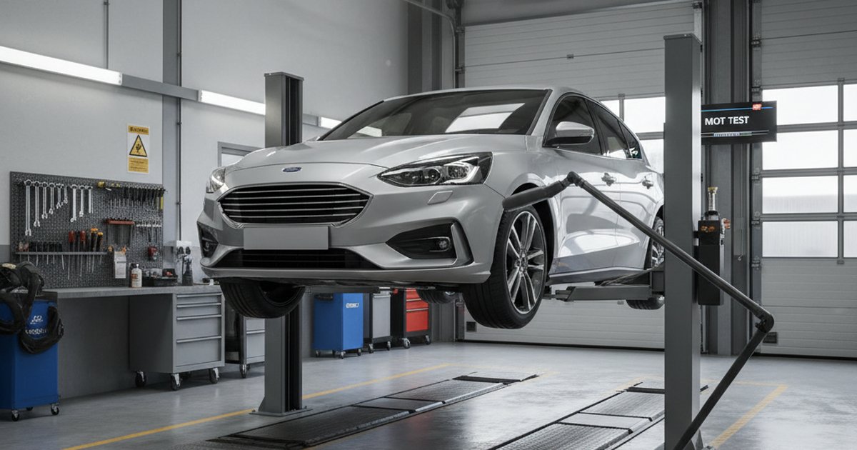 Car undergoing MOT inspection at a UK testing station
