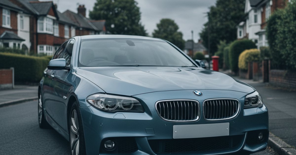 BMW 5 Series parked on a UK suburban street — PlateInsight reliability analysis